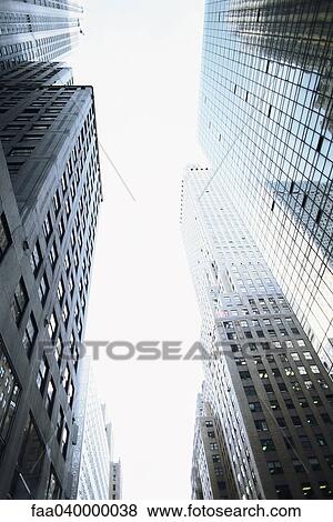 Stock Photo - High rise buildings, low angle view. Fotosearch
