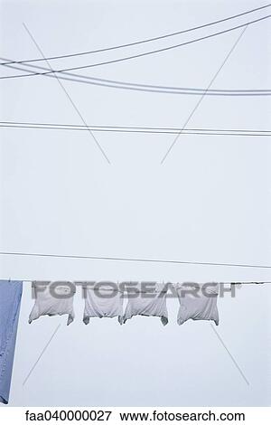 Stock Photo - Laundry hanging on clothes-line. Fotosearch