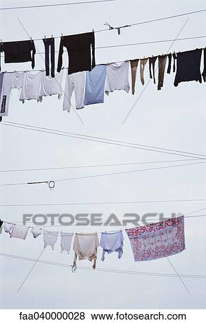 Laundry hanging on clothes-lines View Large Photo Image Stock Photo - Laundry hanging on clothes-lines. Fotosearch