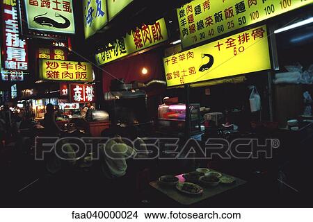 People eating in outdoor restaurant View Large Photo Image Picture - People eating in outdoor restaurant. Fotosearch