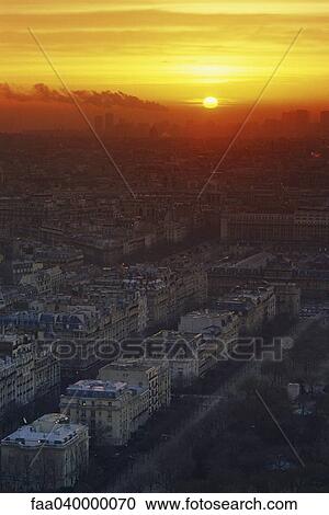 Sun rising over Paris, France View Large Photo Image Stock Image - Sun rising over Paris, France. Fotosearch