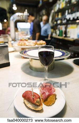 Tapas bar, close-up of stuffed prosciutto View Large Photo Image Stock Image - Tapas bar, close-up of stuffed prosciutto. Fotosearch