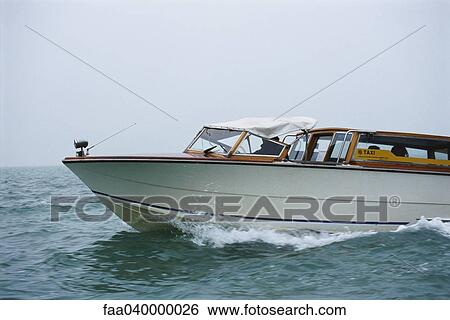 Water taxi View Large Photo Image Stock Photograph - Water taxi. Fotosearch