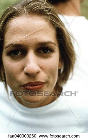 Woman looking at camera, portrait View Large Photo Image Stock Image - Woman looking at camera, portrait. Fotosearch