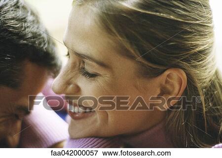 "Couple laughing, eyes closed, close-up" View Large Photo Image Stock Photo - "Couple laughing, eyes closed, close-up". Fotosearch