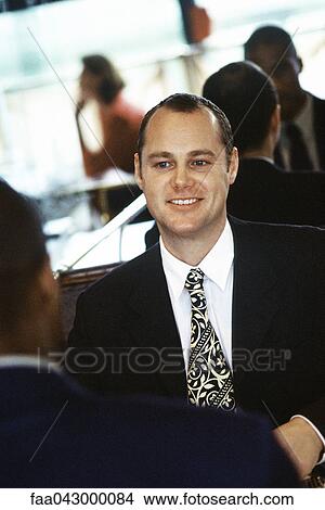 Businessmen together in restaurant View Large Photo Image Picture - Businessmen together in restaurant. Fotosearch