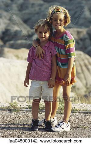 Sisters together outdoors, portrait View Large Photo Image Stock Image - Sisters together outdoors, portrait. Fotosearch