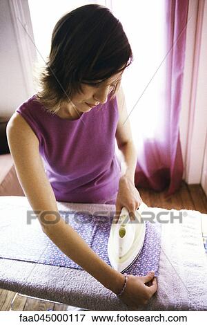 Stock Photo - Woman ironing. Fotosearch