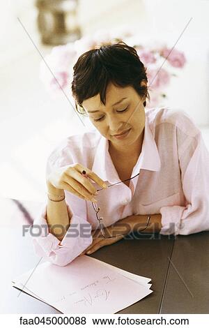 Woman reading letter View Large Photo Image Stock Photo - Woman reading letter. Fotosearch