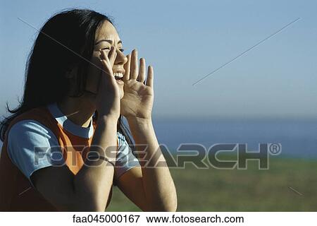 Stock Photo - Woman shouting. Fotosearch