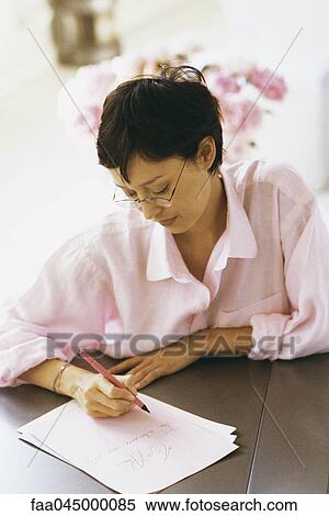 Woman writing love letter View Large Photo Image Stock Photography - Woman writing love letter. Fotosearch