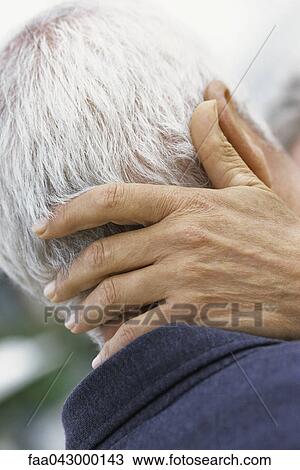 Woman's hand on back of man's neck, close-up View Large Photo Image Stock Image - Woman's hand on back of man's neck, close-up. Fotosearch