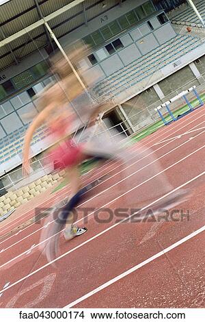 Women running on track, blurred View Large Photo Image Picture - Women running on track, blurred. Fotosearch