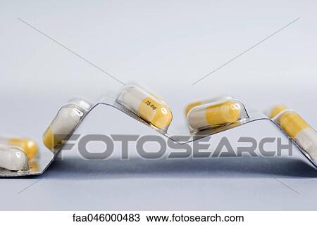 Blister pack containing capsules of an antiviral drug (a neuraminidase inhibitor) used to treat H1N1 flu View Large Photo Image Stock Image - Blister pack containing capsules of an antiviral drug (a neuraminidase inhibitor) used to treat H1N1 flu. Fotosearch