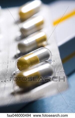 Blister pack of capsules an antiviral drug (a neuraminidase inhibitor) used to treat H1N1 flu View Large Photo Image Picture - Blister pack of capsules an antiviral drug (a neuraminidase inhibitor) used to treat H1N1 flu. Fotosearch