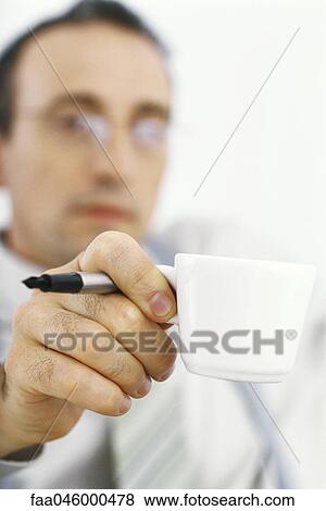 Stock Photo - Businessman on coffee break. Fotosearch