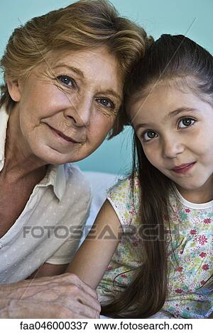 Stock Photo - Grandmother and granddaughter, portrait. Fotosearch
