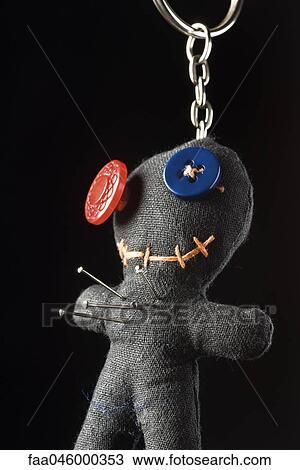 Stock Image - Handmade charm used as pincushion or voodoo doll. Fotosearch