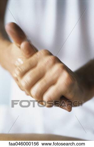Massage therapist rubbing hands together, cropped View Large Photo Image Stock Photograph - Massage therapist rubbing hands together, cropped. Fotosearch
