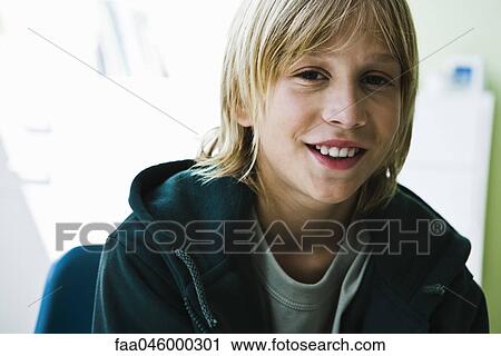 Stock Image - Preteen boy, portrait. Fotosearch