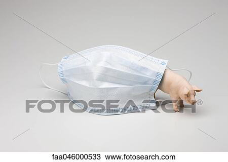 Swine flu concept, flu mask and toy pig View Large Photo Image Stock Image - Swine flu concept, flu mask and toy pig. Fotosearch