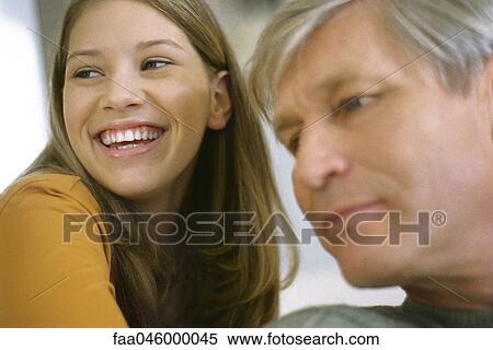 Teenage girl with grandfather View Large Photo Image Stock Photography - Teenage girl with grandfather. Fotosearch