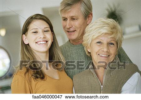Teenage girl with grandparents View Large Photo Image Stock Photo - Teenage girl with grandparents. Fotosearch