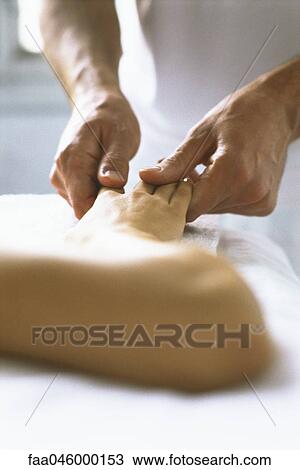 Therapist treating patient's hand, cropped View Large Photo Image Stock Image - Therapist treating patient's hand, cropped. Fotosearch