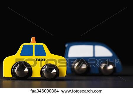 Toy cars, side view View Large Photo Image Picture - Toy cars, side view. Fotosearch