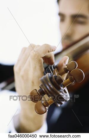 Violinist playing violin, close-up View Large Photo Image Stock Image - Violinist playing violin, close-up. Fotosearch