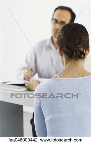 Woman answering questions for job interview View Large Photo Image Stock Image - Woman answering questions for job interview. Fotosearch