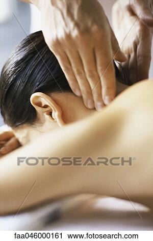 Woman receiving neck massage, cropped view View Large Photo Image Stock Image - Woman receiving neck massage, cropped view. Fotosearch