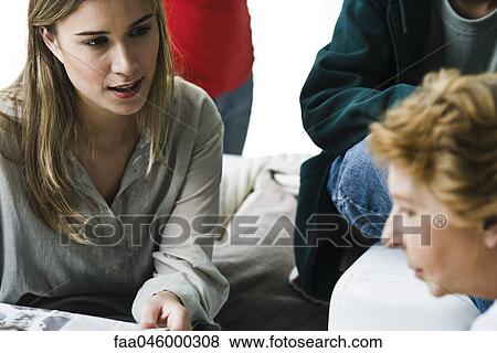 Woman speaking to elderly mother View Large Photo Image Stock Photo - Woman speaking to elderly mother. Fotosearch