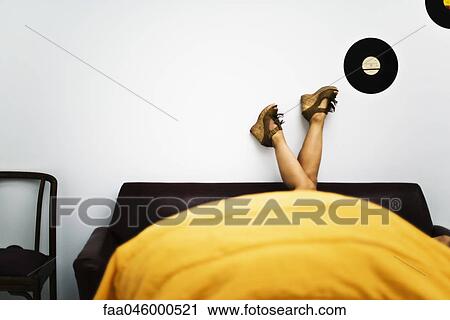 Woman's legs raised, wearing platform shoes View Large Photo Image Stock Image - Woman's legs raised, wearing platform shoes. Fotosearch