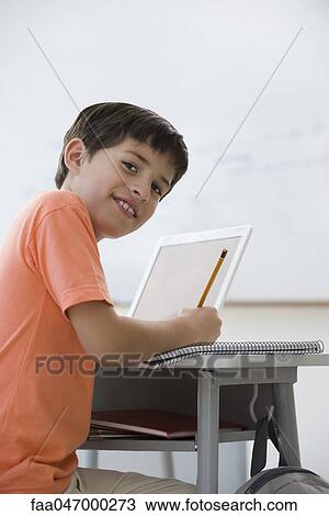 Stock Image - Elementary school student. Fotosearch