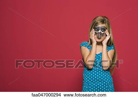 Picture - Girl wearing mask, portrait. Fotosearch