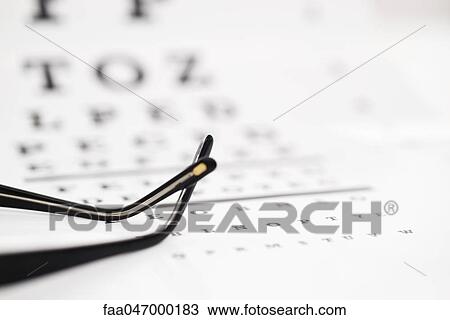 Glasses on eye chart, cropped View Large Photo Image Stock Image - Glasses on eye chart, cropped. Fotosearch