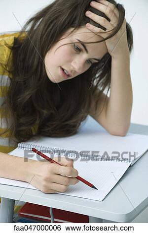 Stock Photograph - High school student studying. Fotosearch