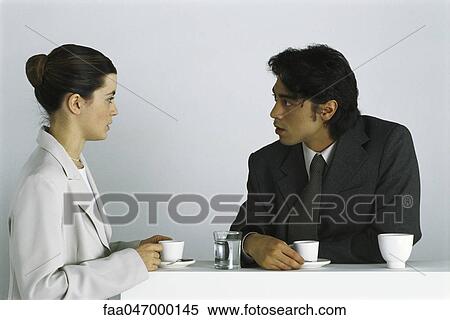 Male and female colleagues having coffee break together View Large Photo Image Stock Photography - Male and female colleagues having coffee break together. Fotosearch