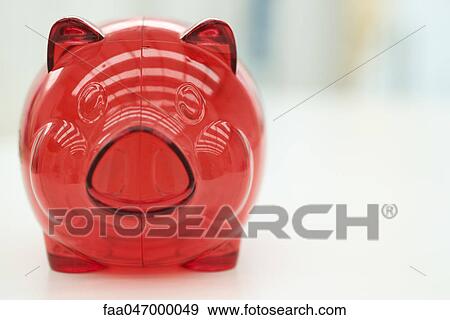 Red plastic piggy bank View Large Photo Image Stock Photo - Red plastic piggy bank. Fotosearch