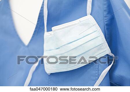 Scrub top, surgical mask View Large Photo Image Stock Image - Scrub top, surgical mask. Fotosearch