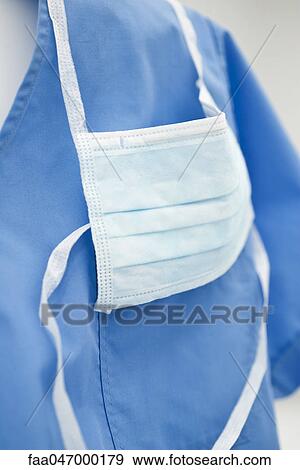 Scrub top, surgical mask View Large Photo Image Stock Photo - Scrub top, surgical mask. Fotosearch