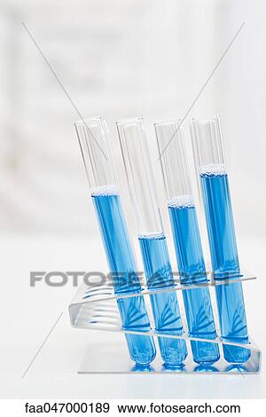 Stock Photo - Test tubes containing blue liquid. Fotosearch