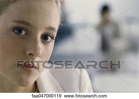 Young businesswoman in office, portrait View Large Photo Image Stock Photo - Young businesswoman in office, portrait. Fotosearch