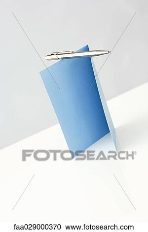 Stock Image - Blank greeting card and pen, close-up. Fotosearch