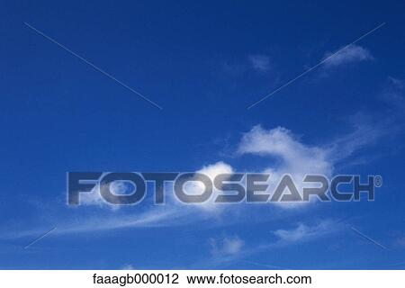 Blue sky with clouds View Large Photo Image Stock Image - Blue sky with clouds. Fotosearch