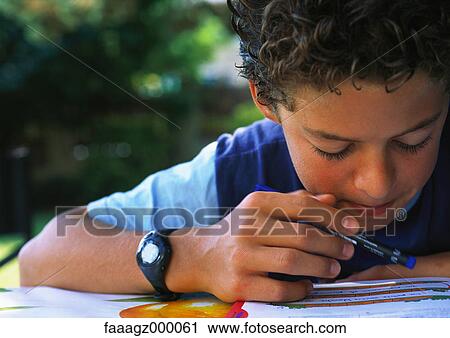 Boy doing homework View Large Photo Image Stock Image - Boy doing homework. Fotosearch