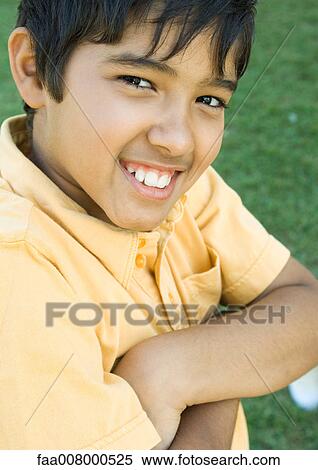 Boy with arms crossed View Large Photo Image Stock Photography - Boy with arms crossed. Fotosearch