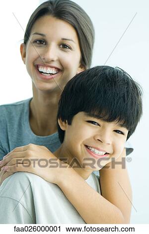 Brother and sister smiling at camera together, portrait View Large Photo Image Stock Image - Brother and sister smiling at camera together, portrait. Fotosearch