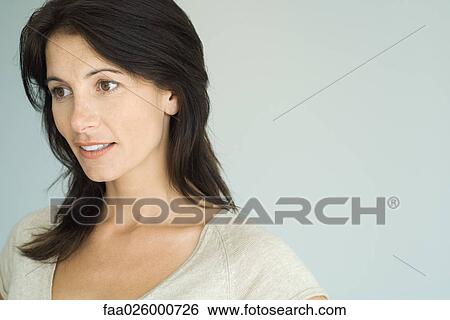 Brunette woman, looking away, head and shoulders, portrait View Large Photo Image Stock Photograph - Brunette woman, looking away, head and shoulders, portrait. Fotosearch